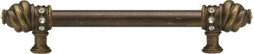 Caché 9'' cc with 5/8'' smooth center long pull with 16 rivoli Swarovski Clear Crystals in Antique Brass. 5671-3C