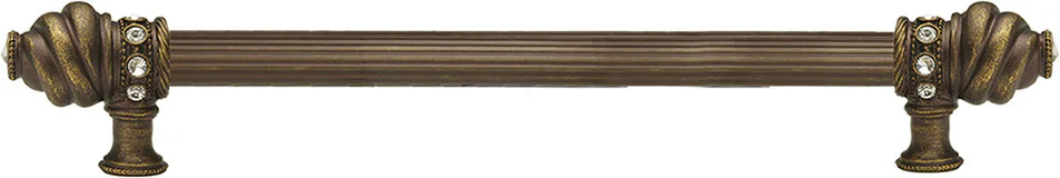 Caché 12'' cc with 5/8'' reeded center long pull with 16 rivoli Swarovski Clear Crystals in Antique Brass. 5672R-3C