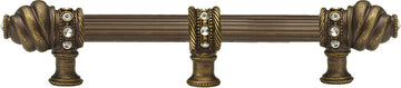 Caché 9'' cc with 5/8'' reeded center long pull & center brace with 16 rivoli Swarovski Clear Crystals in Antique Brass. 5676R-3C