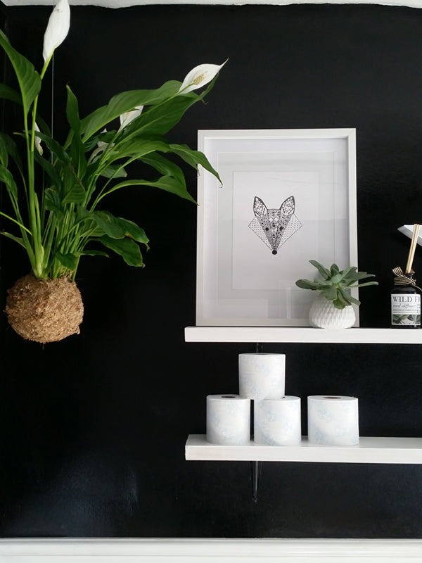 Dramatic black and white family bathroom make-over