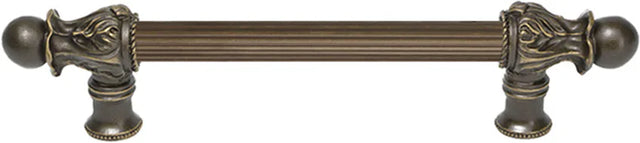 Acanthus 6'' cc with 5/8'' reeded center long pull Romanesque style in Antique Brass. 5550R-3