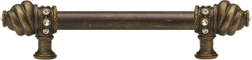 Caché 6'' cc with 5/8'' smooth center long pull with 16 rivoli Swarovski Clear Crystals in Antique Brass. 5670-3C