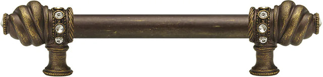 Caché 6'' cc with 5/8'' smooth center long pull with 16 rivoli Swarovski Clear Crystals in Antique Brass. 5670-3C