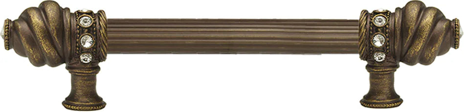 Caché 6'' cc with 5/8'' reeded center long pull with 16 rivoli Swarovski Clear Crystals in Antique Brass. 5670R-3C