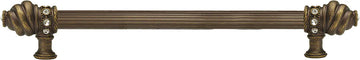 Caché 12'' cc with 5/8'' reeded center long pull with 16 rivoli Swarovski Clear Crystals in Antique Brass. 5672R-3C
