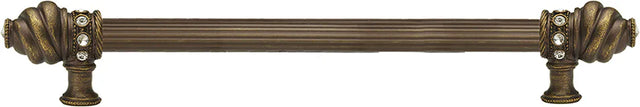 Caché 12'' cc with 5/8'' reeded center long pull with 16 rivoli Swarovski Clear Crystals in Antique Brass. 5672R-3C