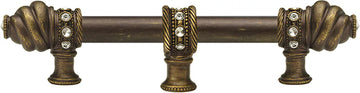 Caché 6'' cc with 5/8'' smooth center long pull & center brace with 16 rivoli Swarovski Clear Crystals in Antique Brass. 5675-3C