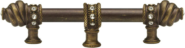Caché 6'' cc with 5/8'' smooth center long pull & center brace with 16 rivoli Swarovski Clear Crystals in Antique Brass. 5675-3C