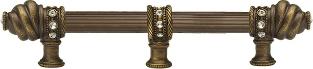 Caché 9'' cc with 5/8'' reeded center long pull & center brace with 16 rivoli Swarovski Clear Crystals in Antique Brass. 5676R-3C