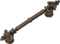 Charlemagne classic 4'' cc pull with small Fleur De Lys on ends in Antique Brass. 576-3