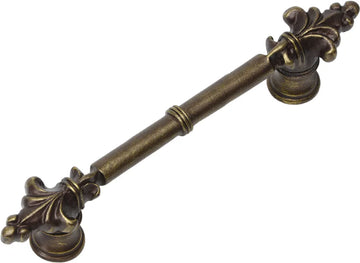 Charlemagne classic 4'' cc pull with small Fleur De Lys on ends in Antique Brass. 576-3