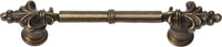 Charlemagne classic 4'' cc pull with small Fleur De Lys on ends in Antique Brass. 576-3