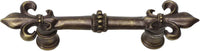 Charlemagne 3'' cc pull with large Fleur De Lys in Antique Brass. 598-3