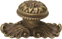 Acanthus large knob with flared foot Rosette style with medium backplate in Antique Brass. 830842-3