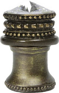 Caché medium round knob with flared foot with an 18mm Swarovski Clear Crystal in Antique Brass. 860B-3C